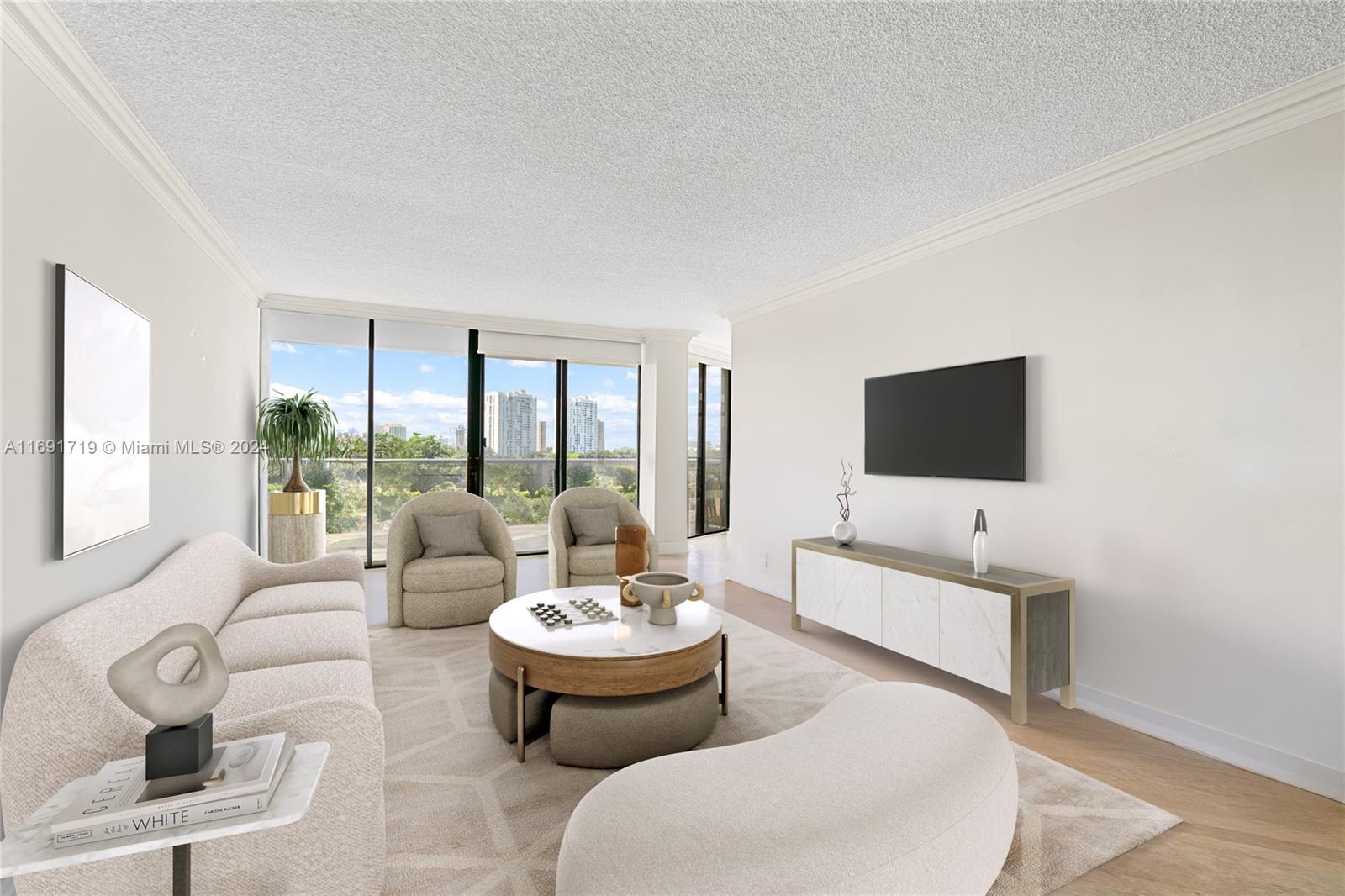 a living room with furniture and a flat screen tv