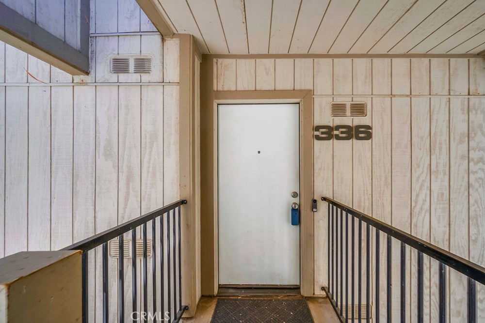 a view of a garage with wooden walls