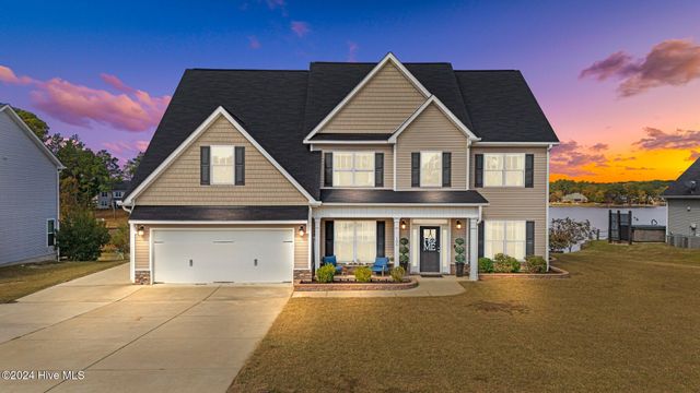 $649,000 | 105 Summer Creek Lane | Carolina Lakes