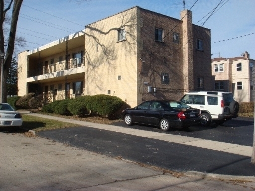 a car parked in front of a building