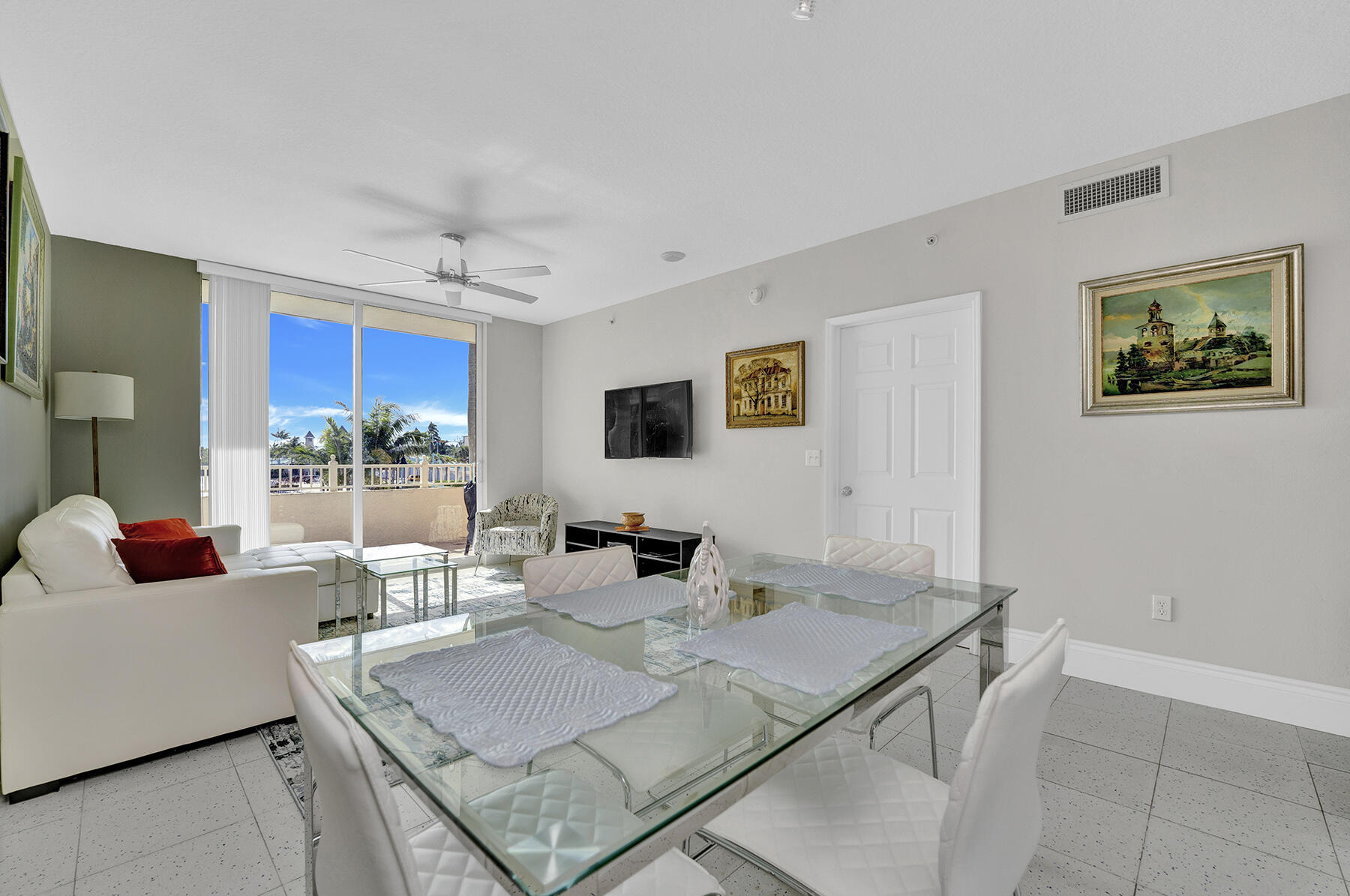 a living room with furniture and a table