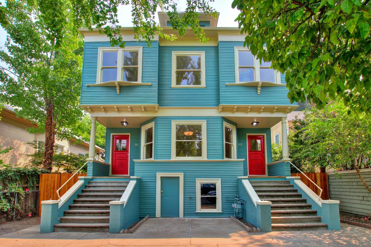 a front view of a house with a yard