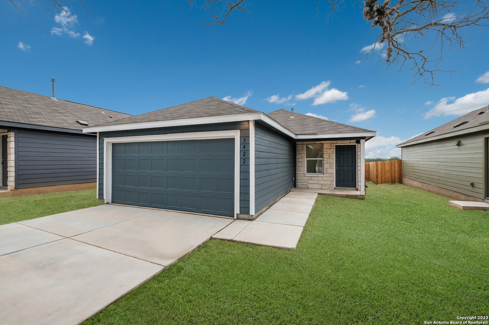 a front view of house with yard