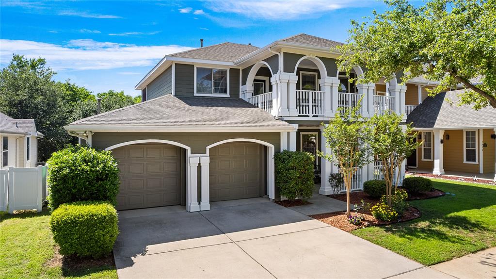 a front view of a house with yard