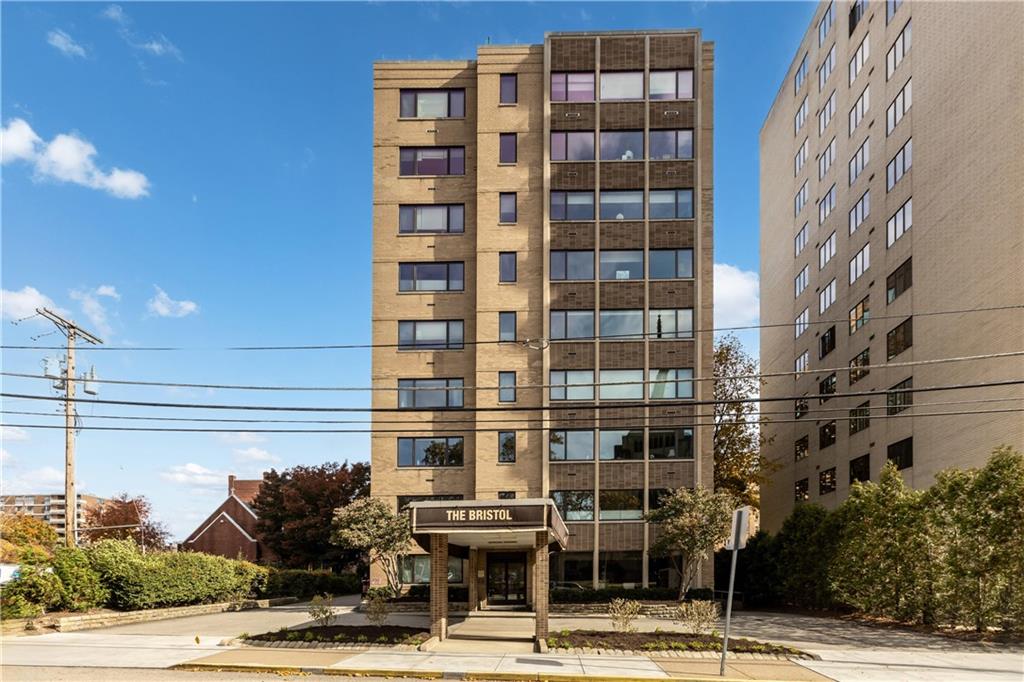 a front view of a building with street view