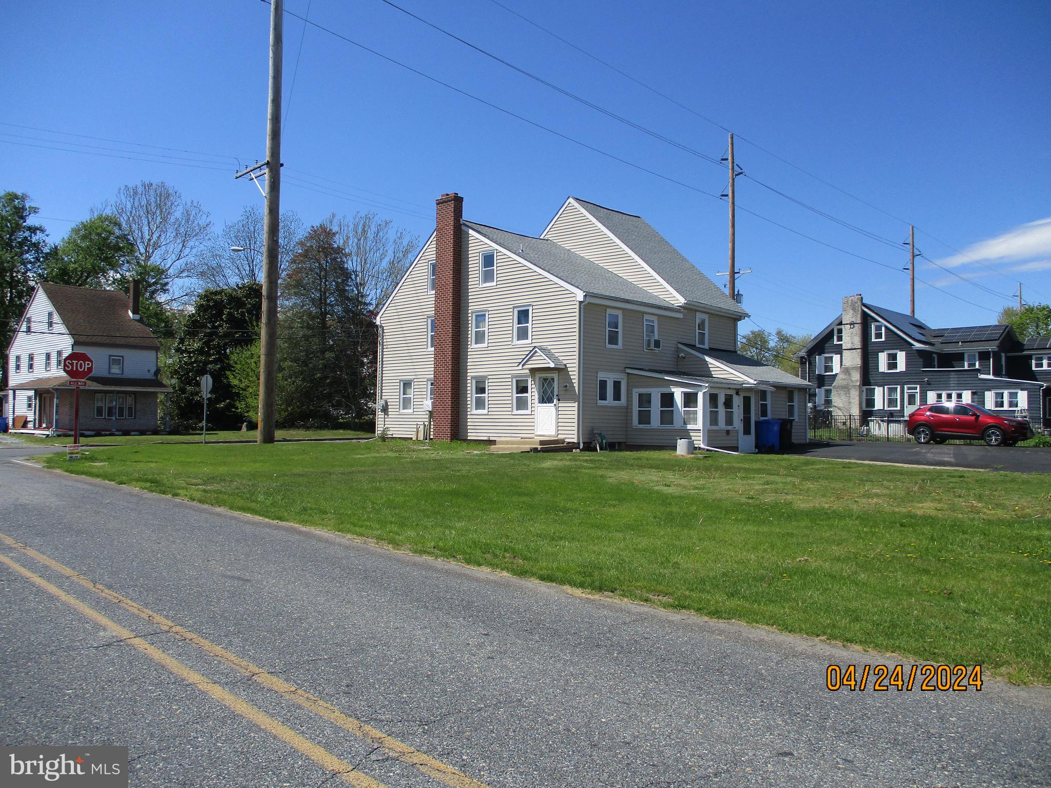 a view of a house with a big yard