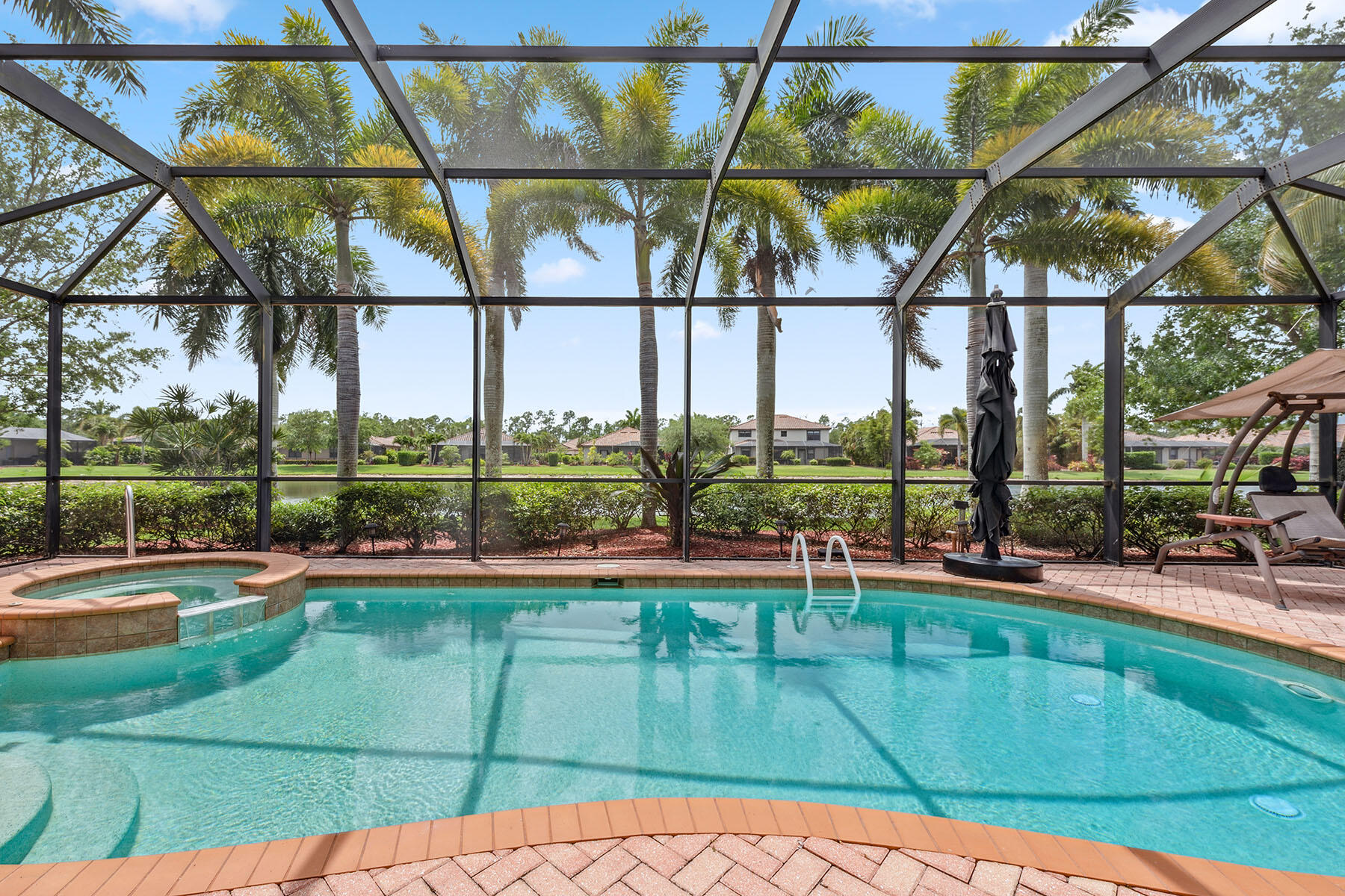 swimming pool with outdoor seating and outdoor view