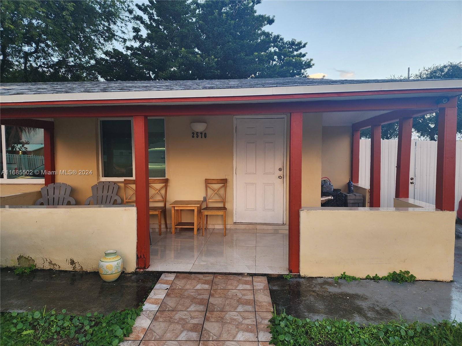 an entryway view with sitting space and garden view