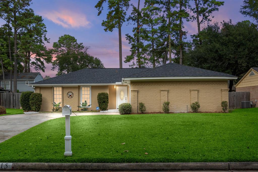 This home sits on a large lot with ample yard space in front and the back, lush landscaping and a well-maintained yard.