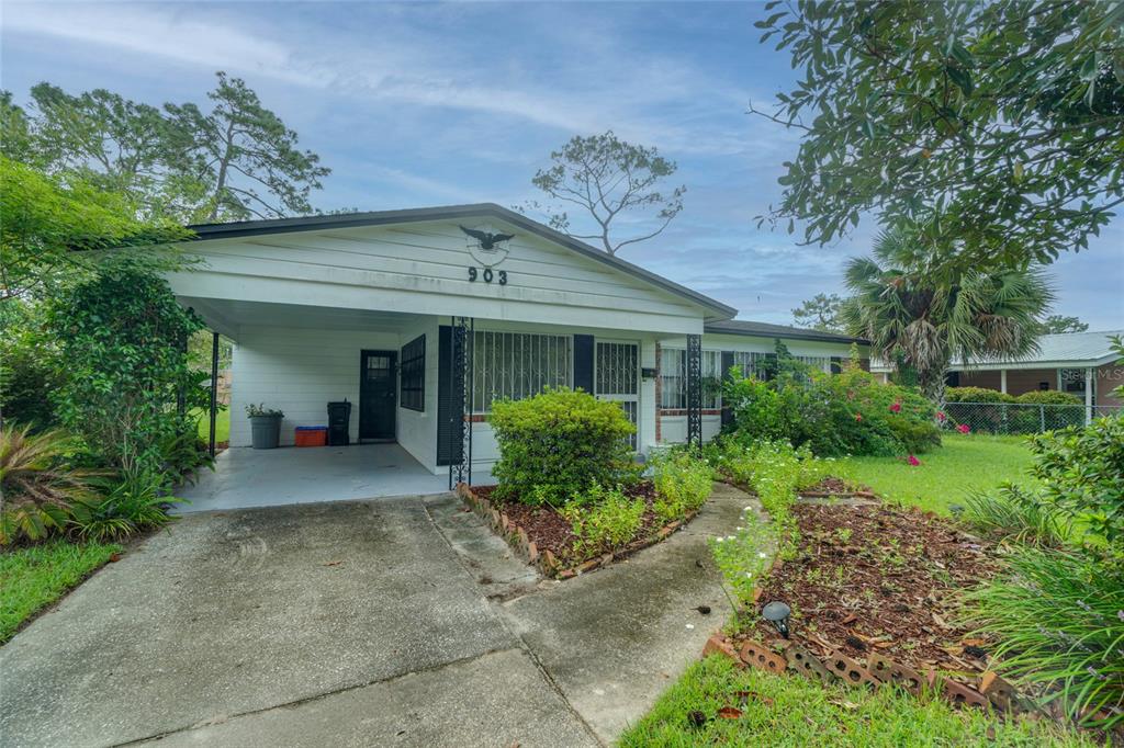 front view of a house with a yard