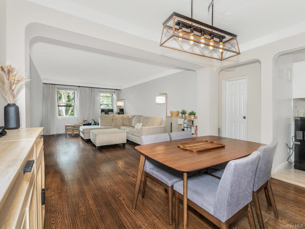 a view of a dining room with furniture and a table