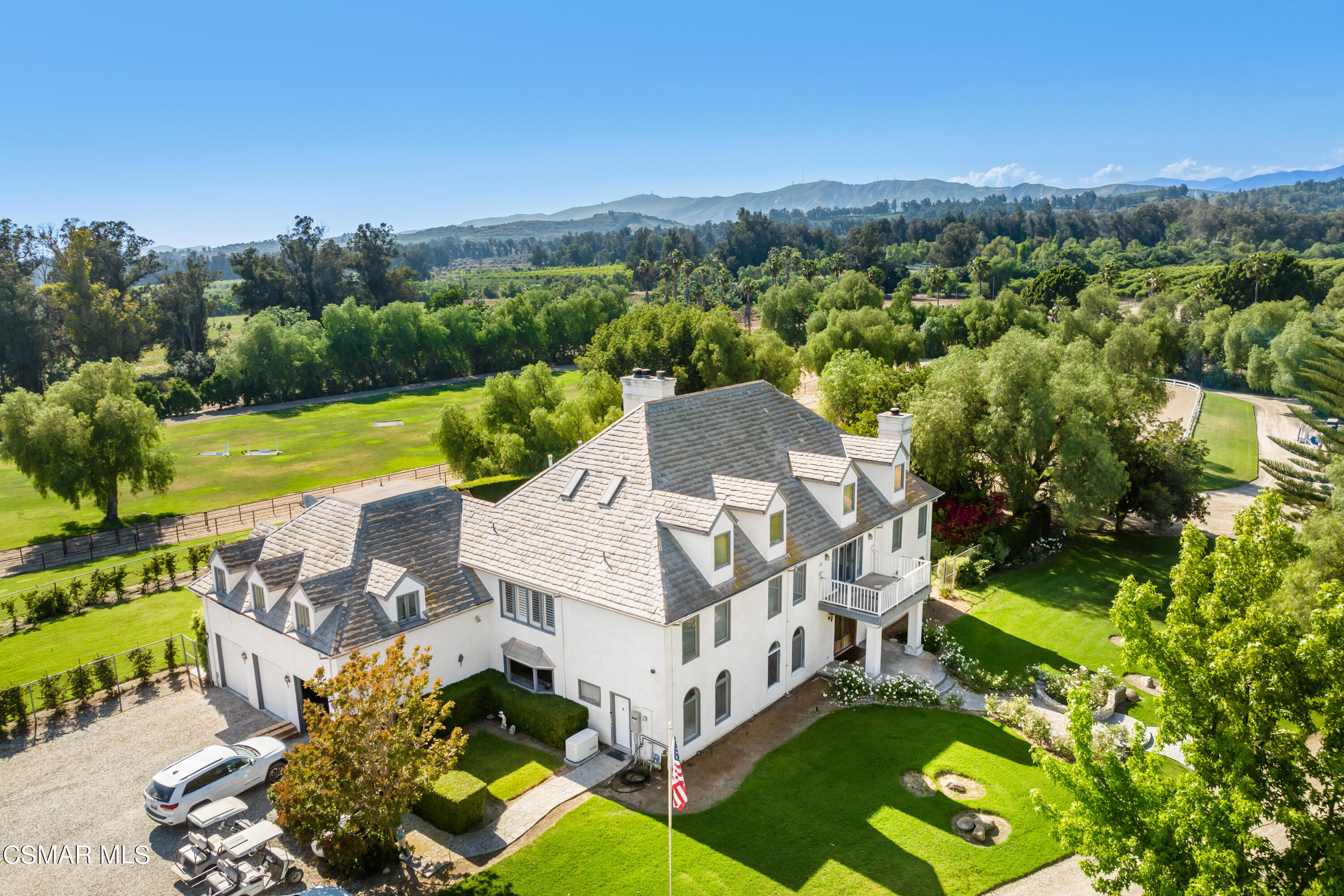 an aerial view of a house with a garden