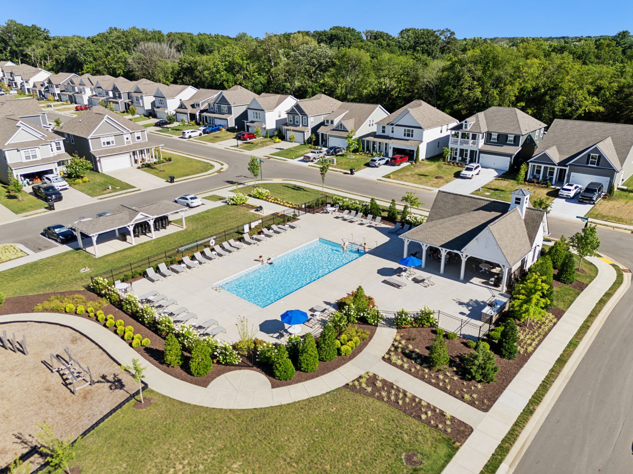 an aerial view of a house with a garden