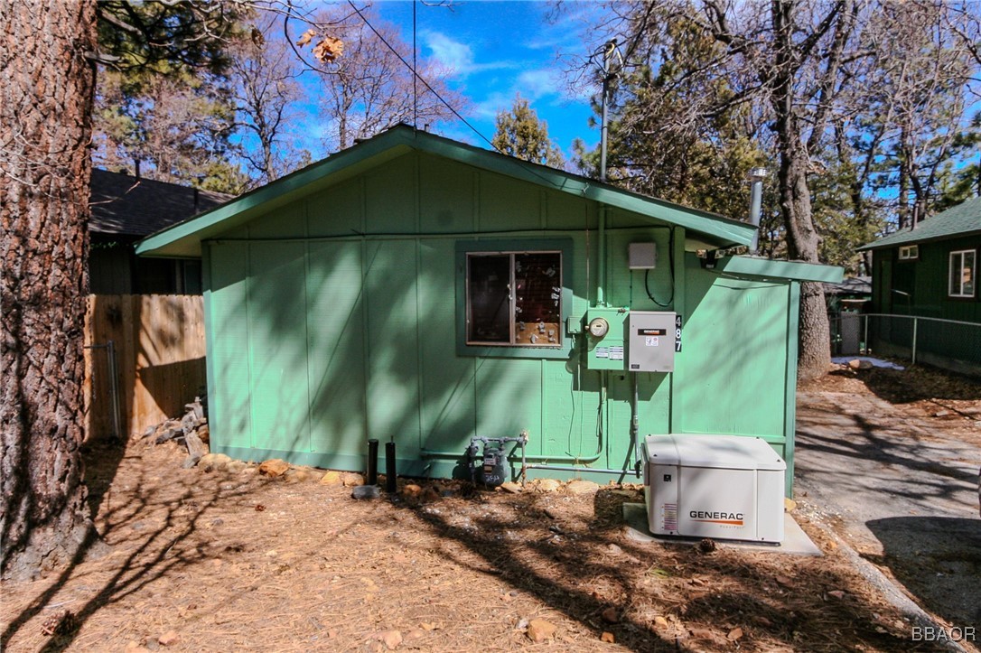 a view of a back yard of the house