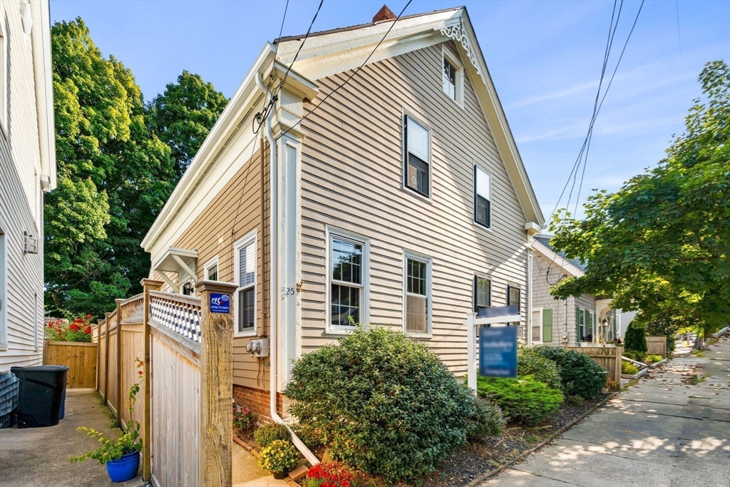 a view of a house with a garage