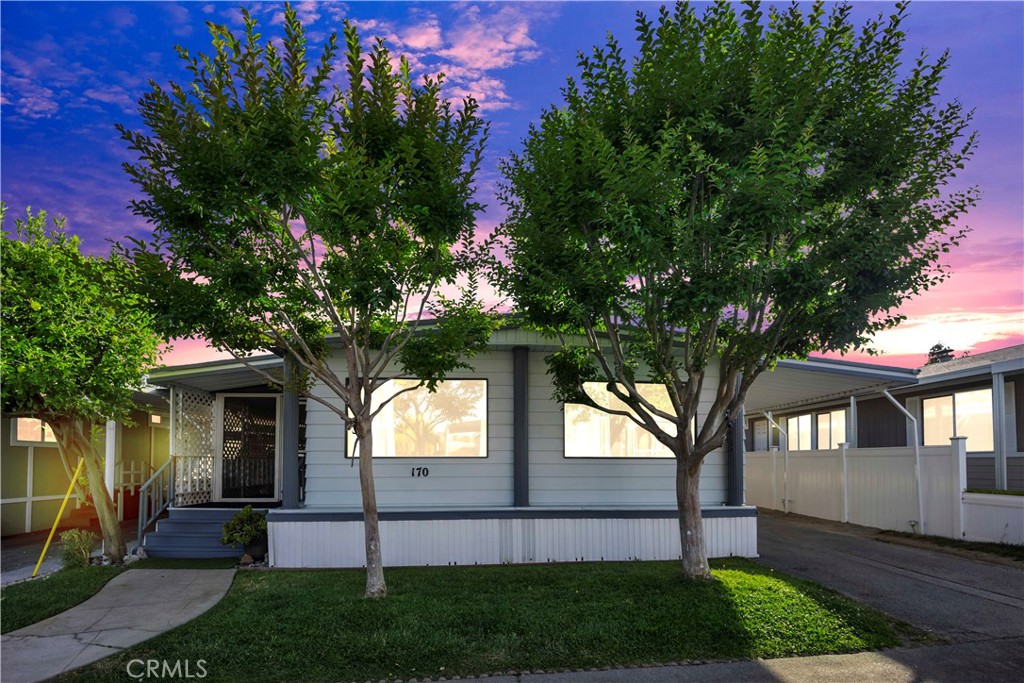 front view of house with a yard