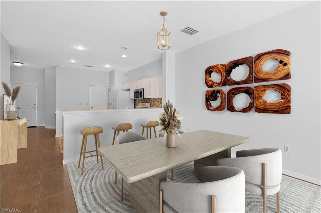 Virtually Staged View of tiled dining area