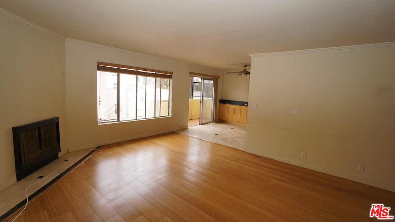 a view of livingroom with hardwood floor and window