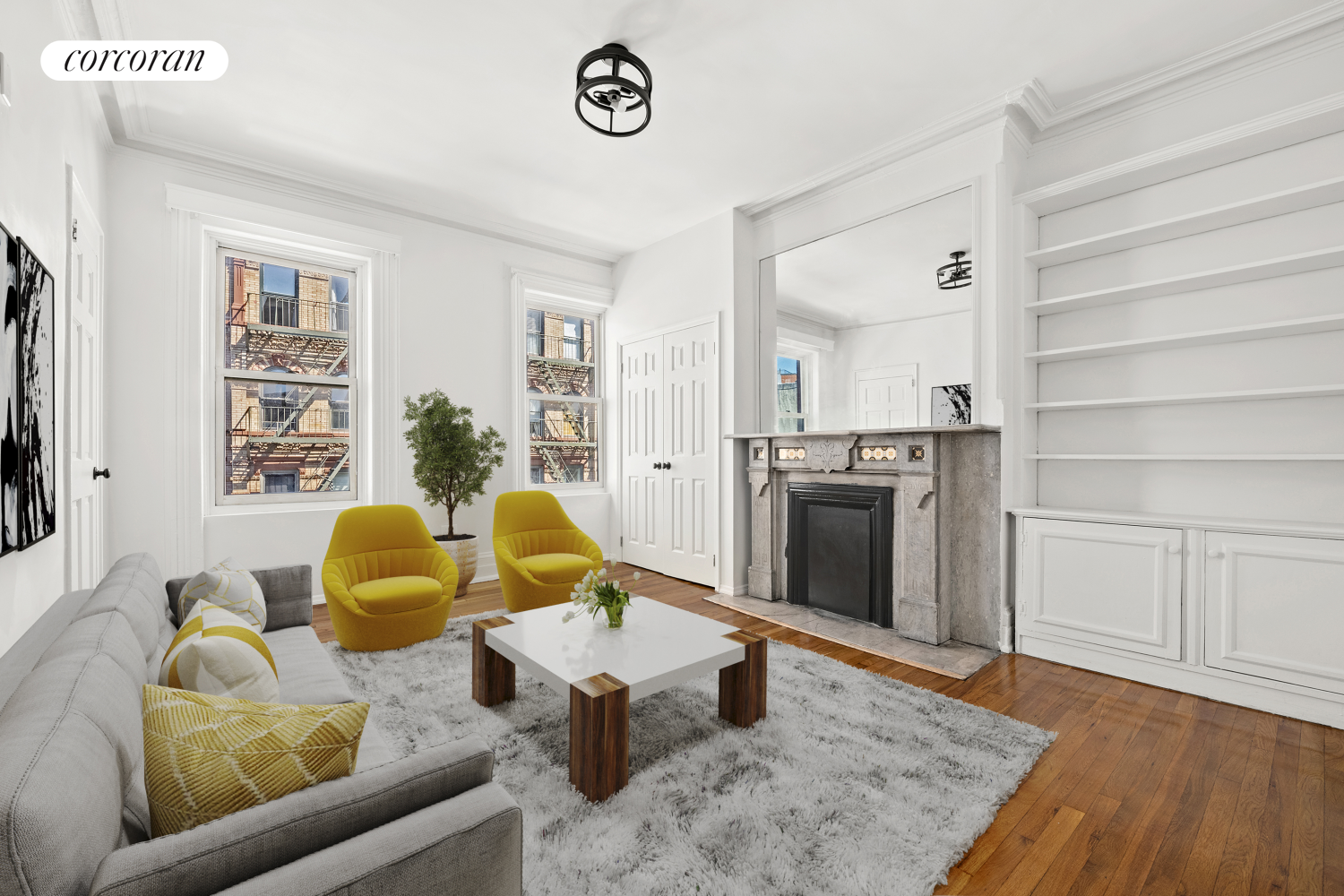 a living room with furniture and a fireplace