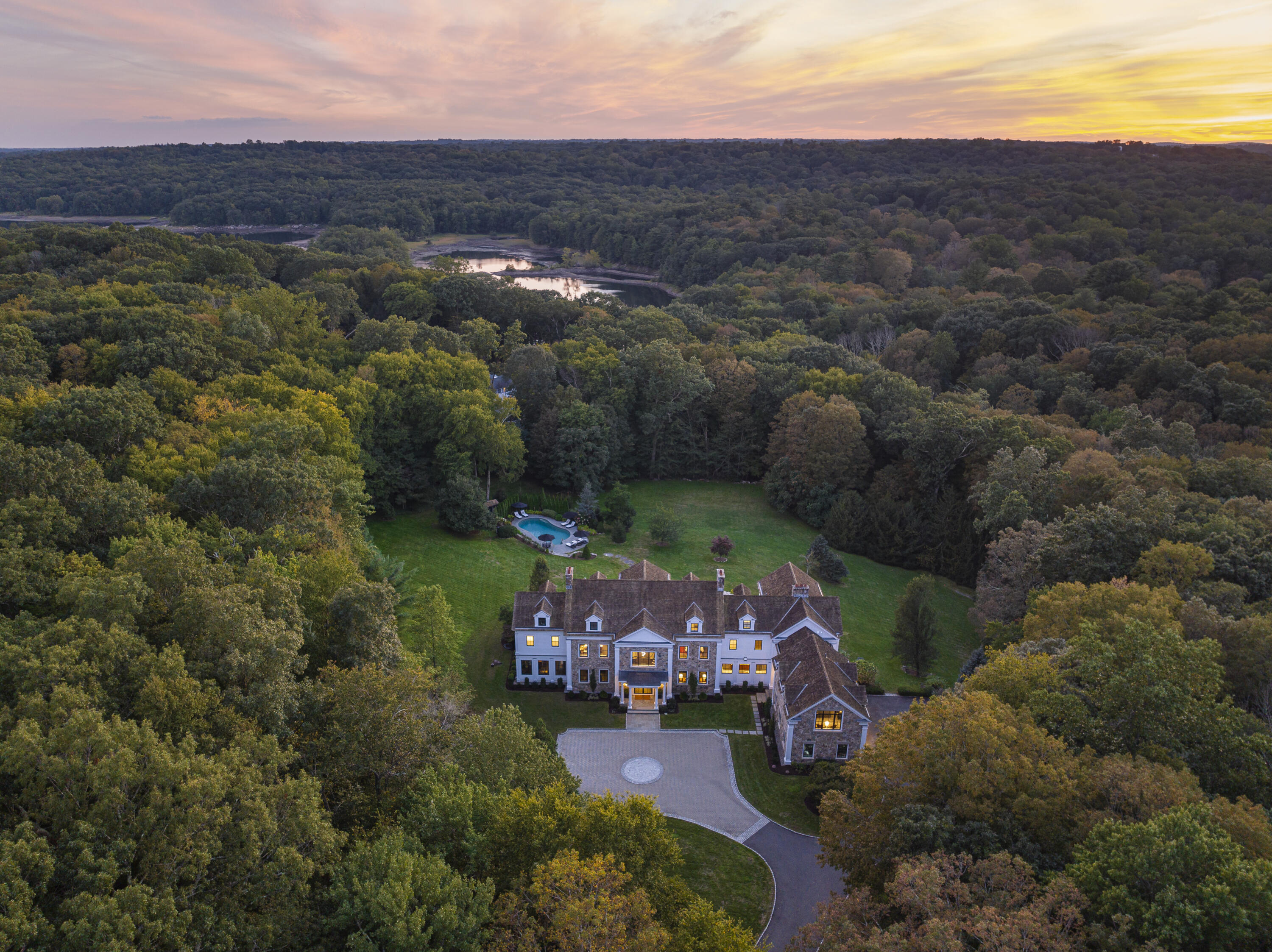 an aerial view of a house with mountain view