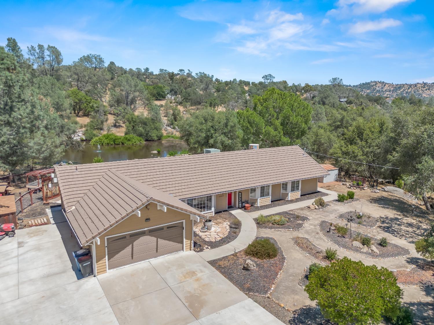 an aerial view of a house with a garden