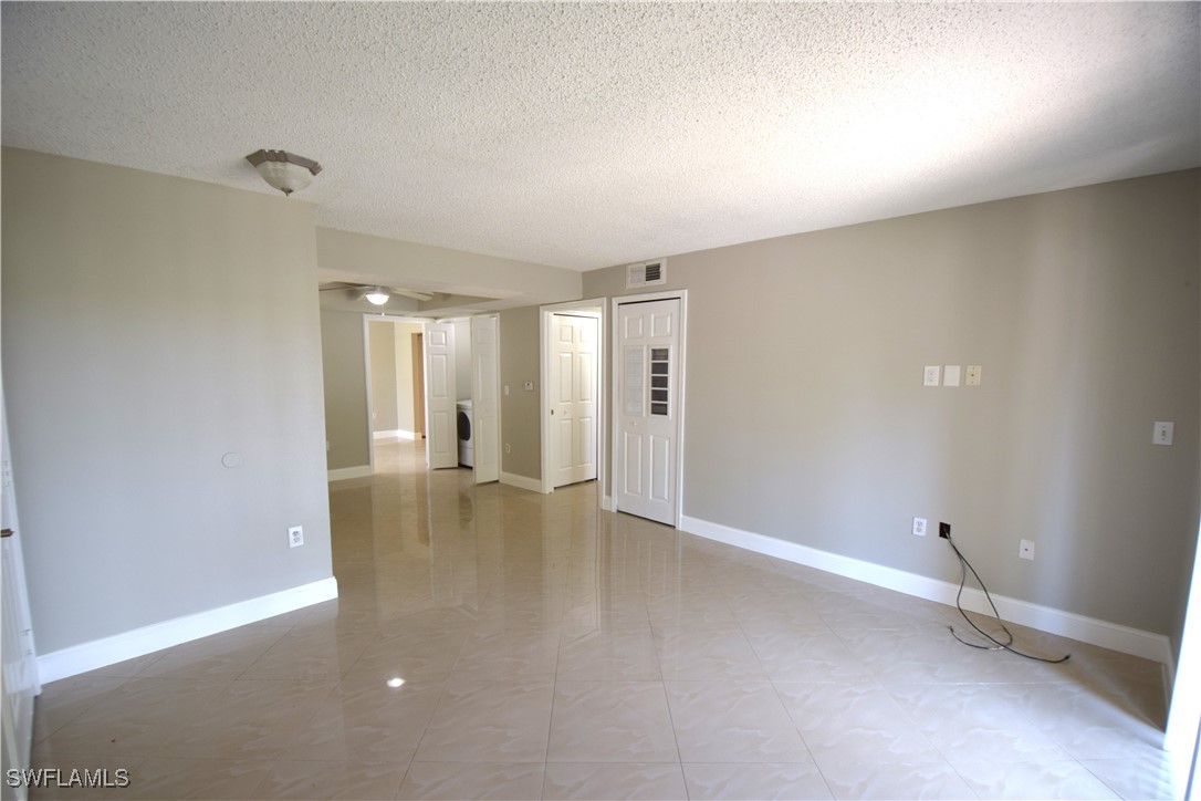 a view of a livingroom with wooden floor