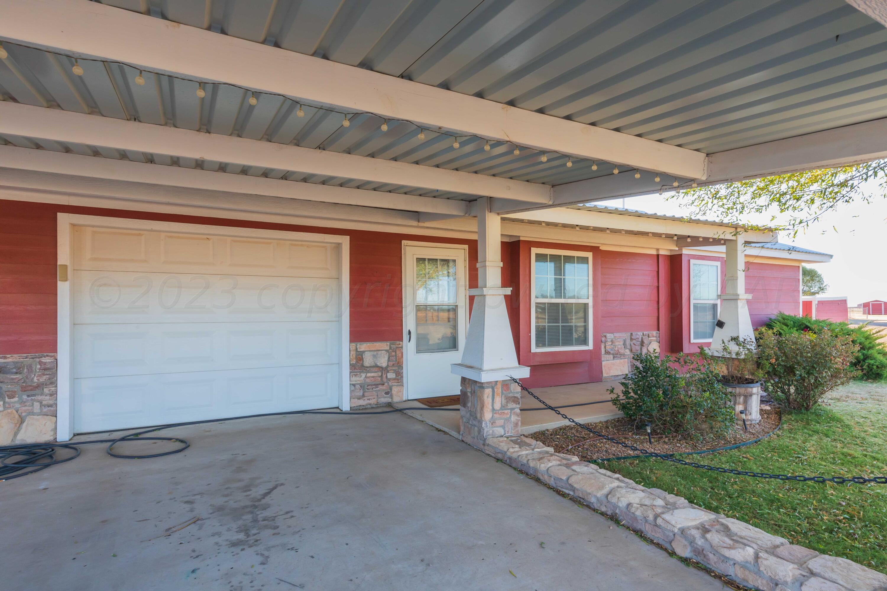 a front view of house with yard