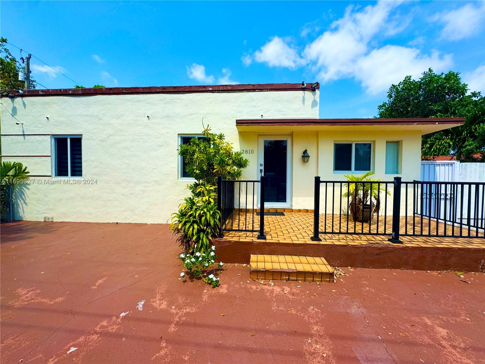 a view of a house with a patio