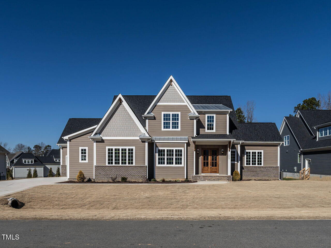 a front of a house with a yard