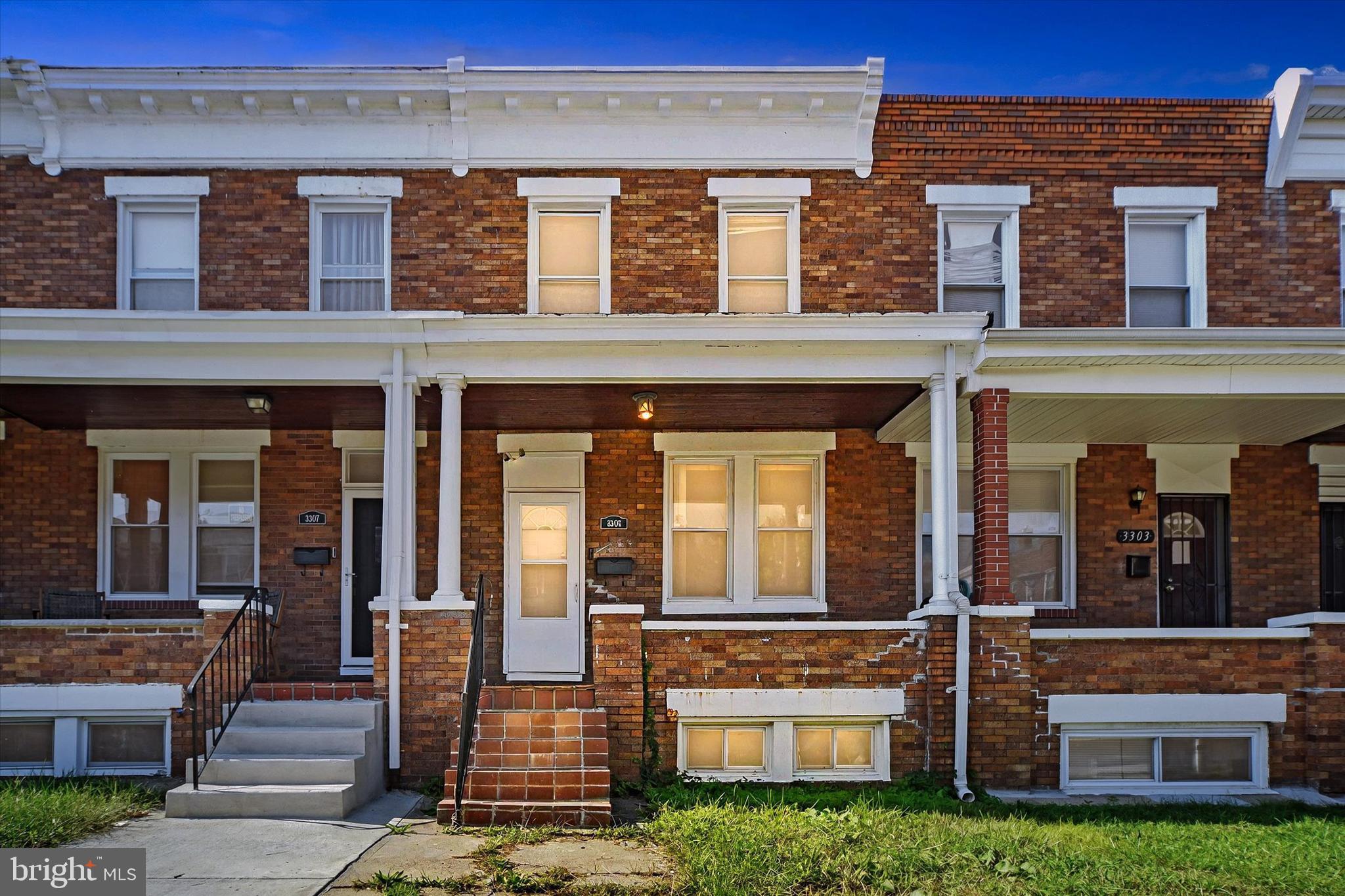 front view of a building with a yard