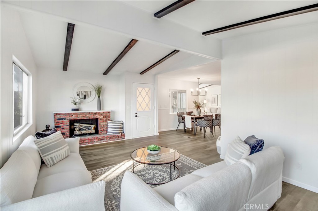 Family Room with Fireplace open to entry and dining