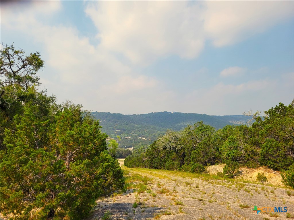 a view of mountains and valleys