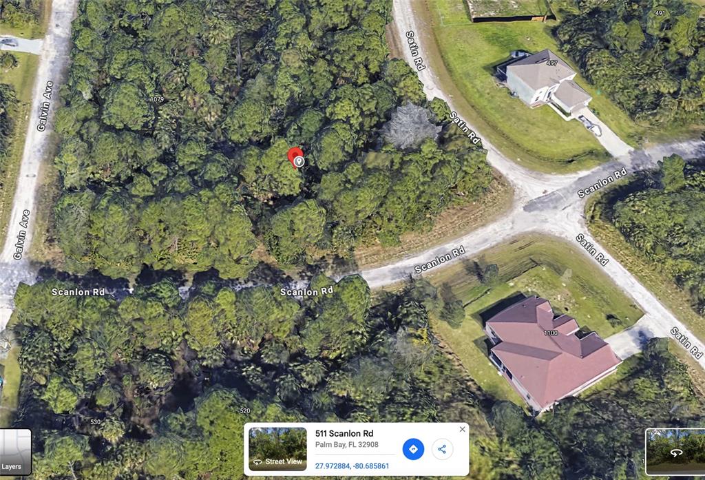 an aerial view of residential house with outdoor space