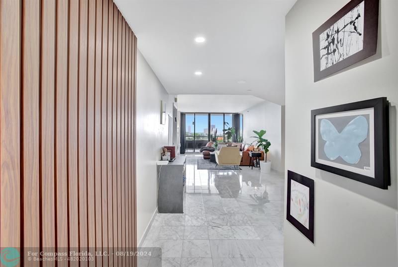 Foyer entry.  Sliding door to den