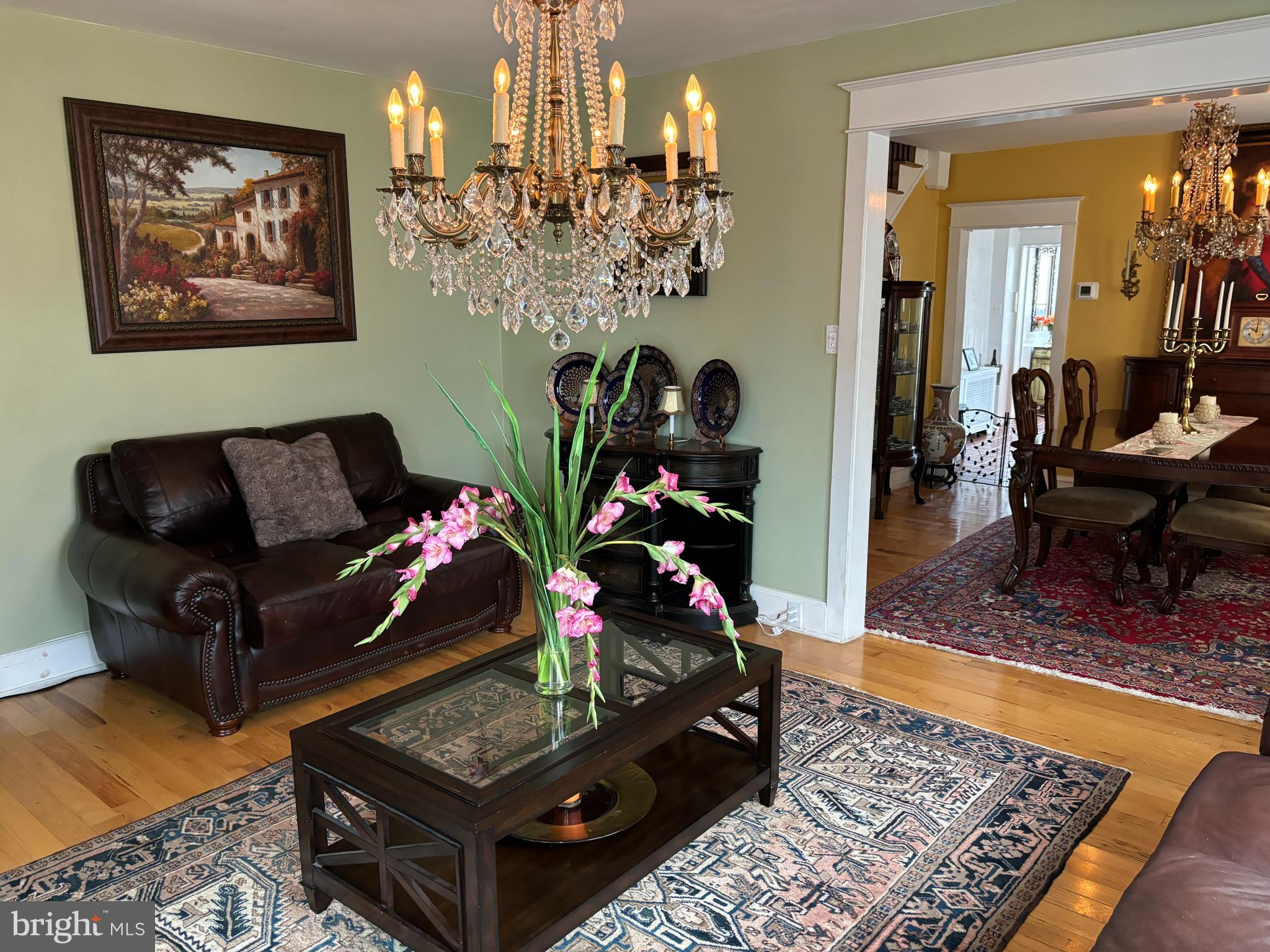 a living room with furniture and a rug