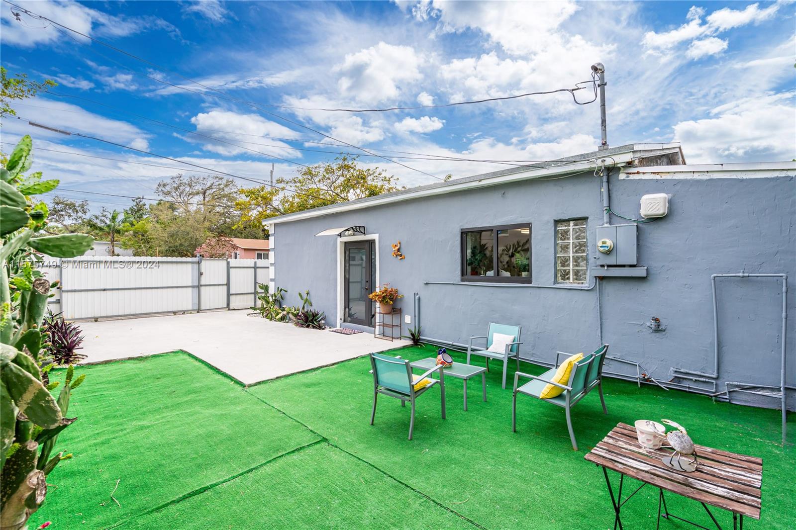 a house view with sitting space and garden space