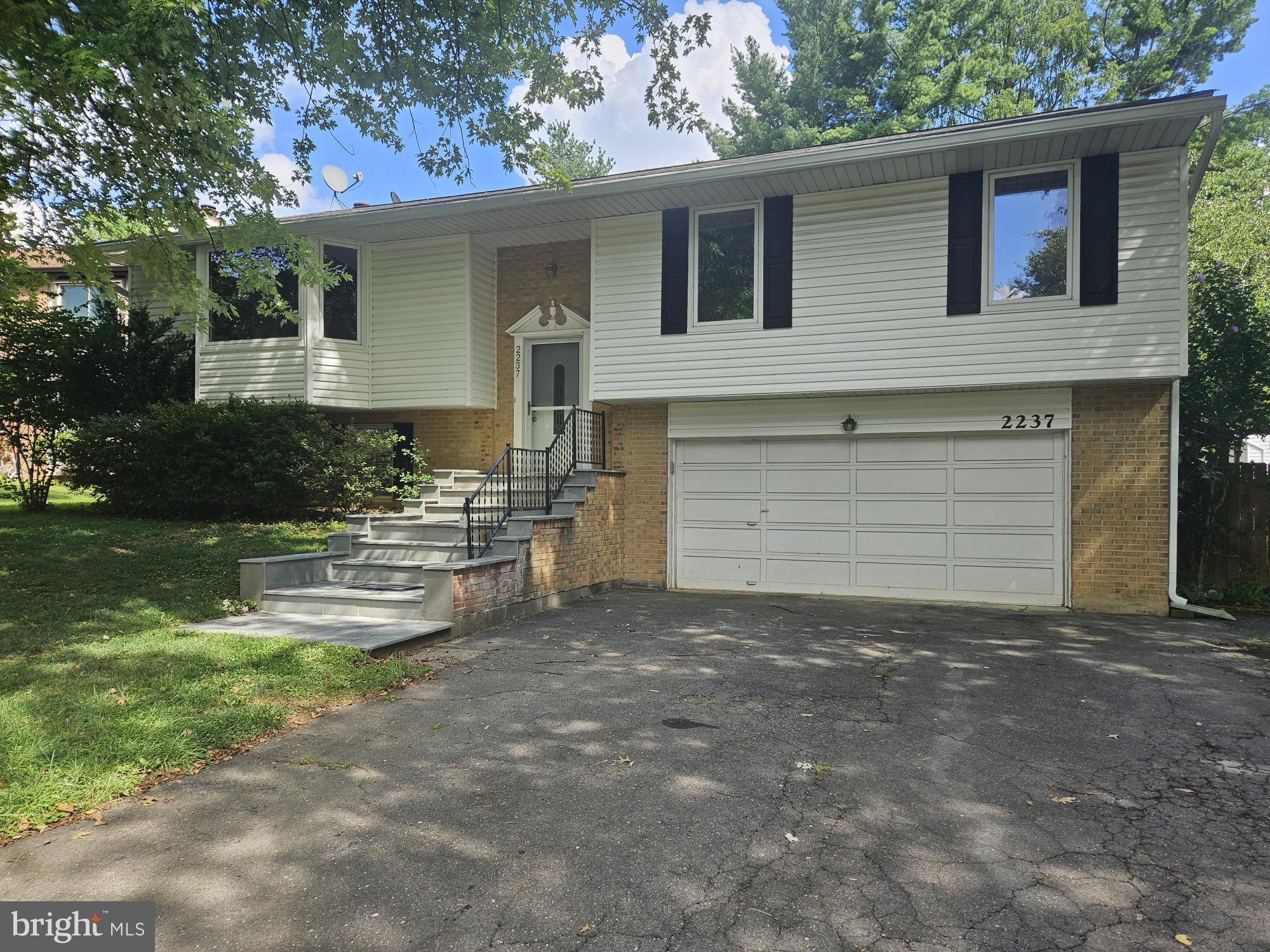 a front view of house with yard