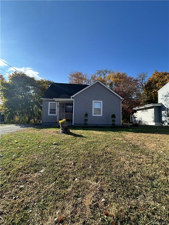 View of front of home with a front lawn