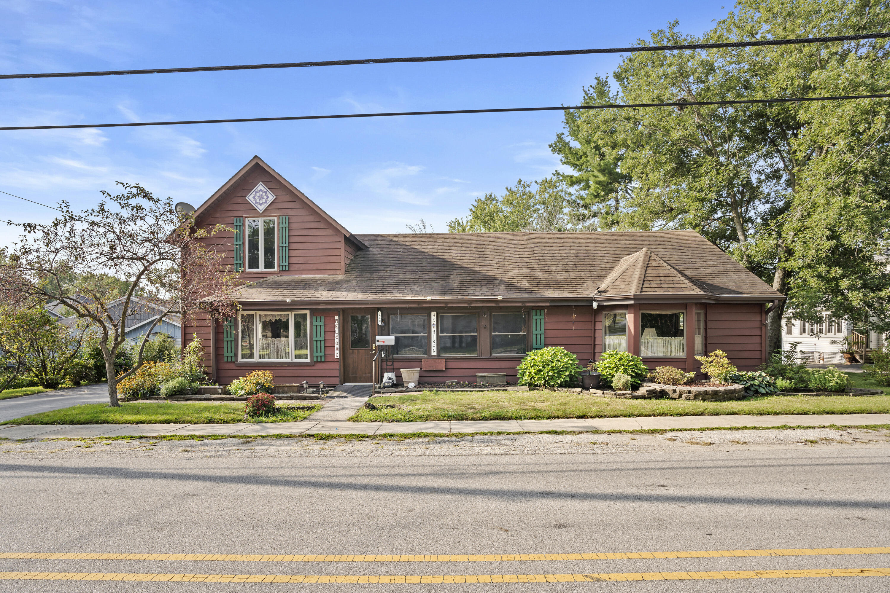 front view of a house with a street