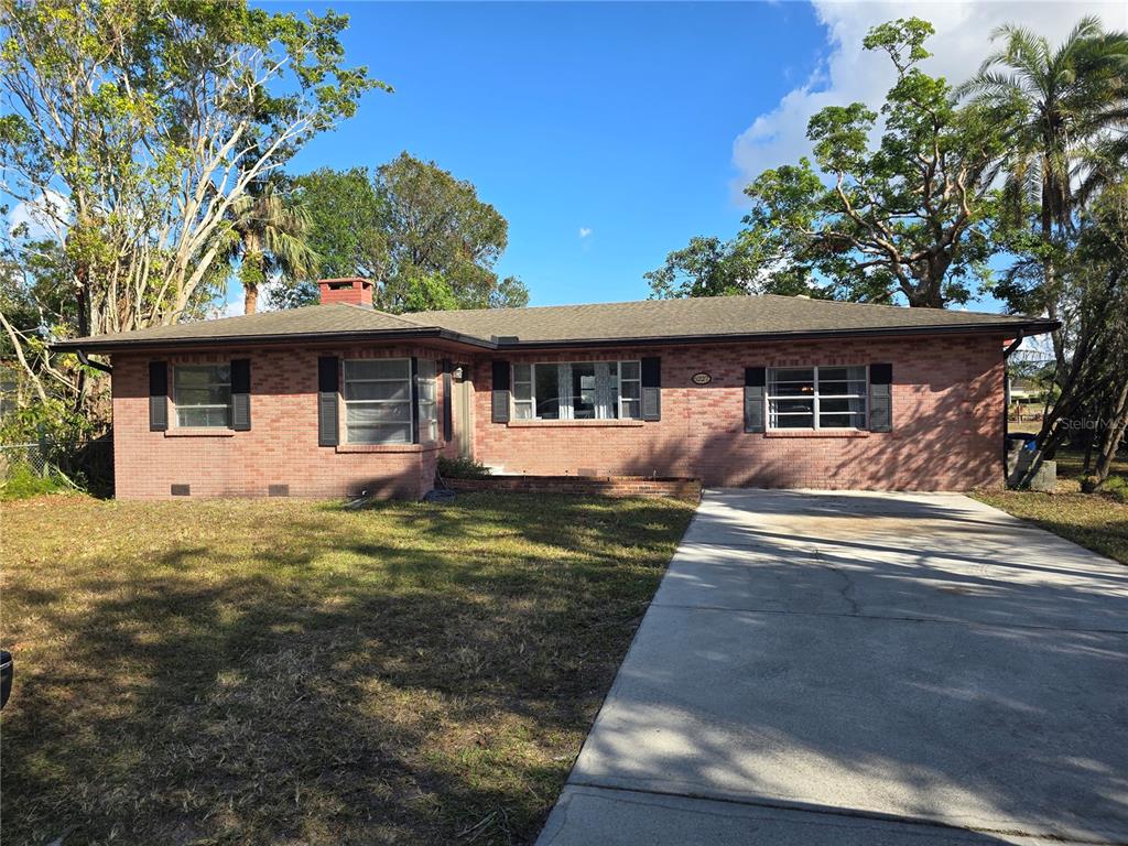 front view of a house with a yard