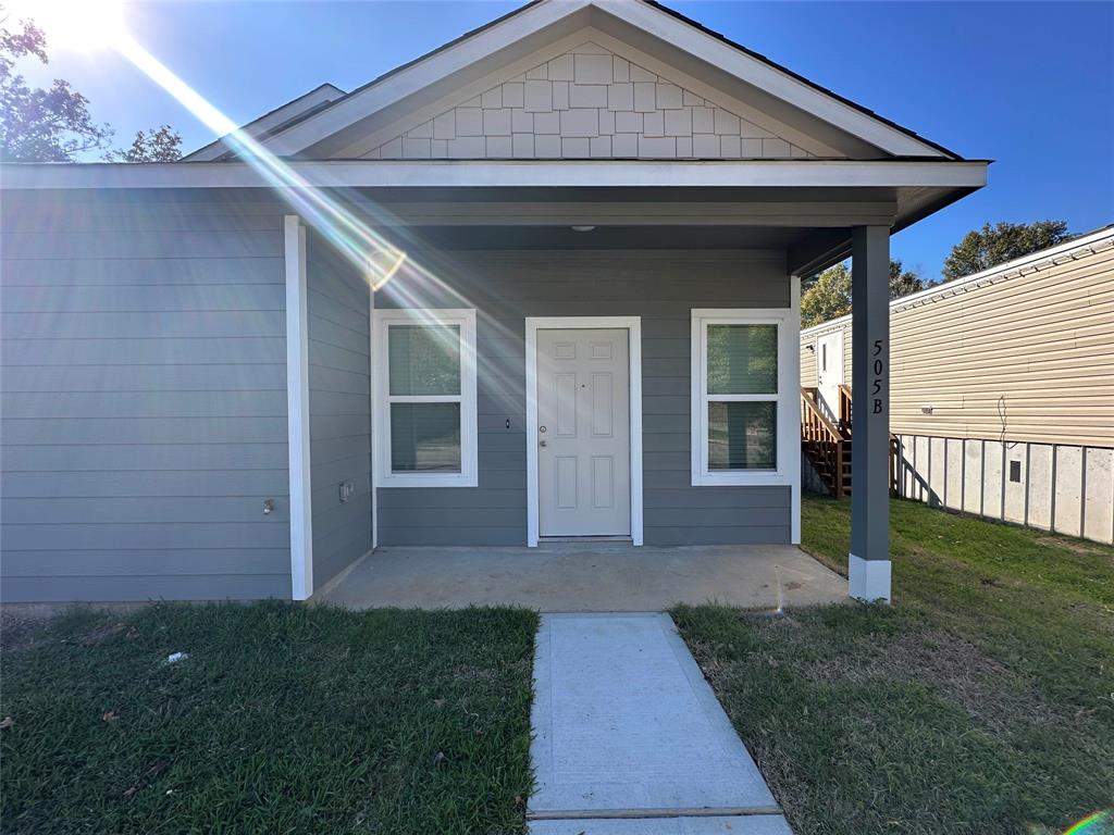 a front view of a house with a porch