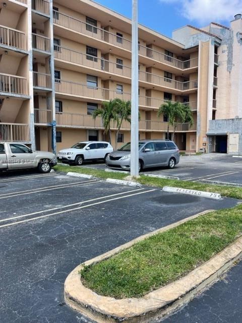 a view of car parked in front of building