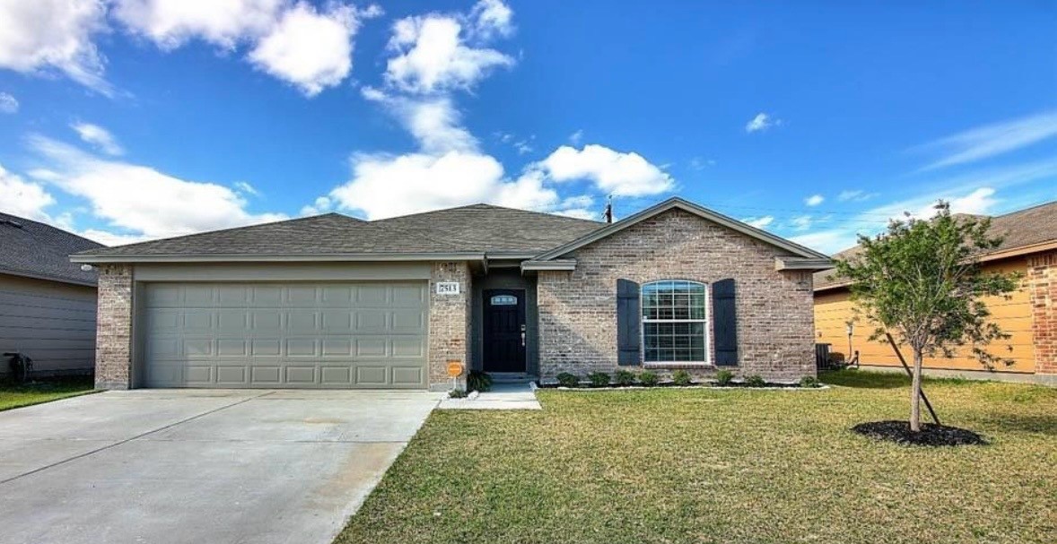 a front view of house with yard