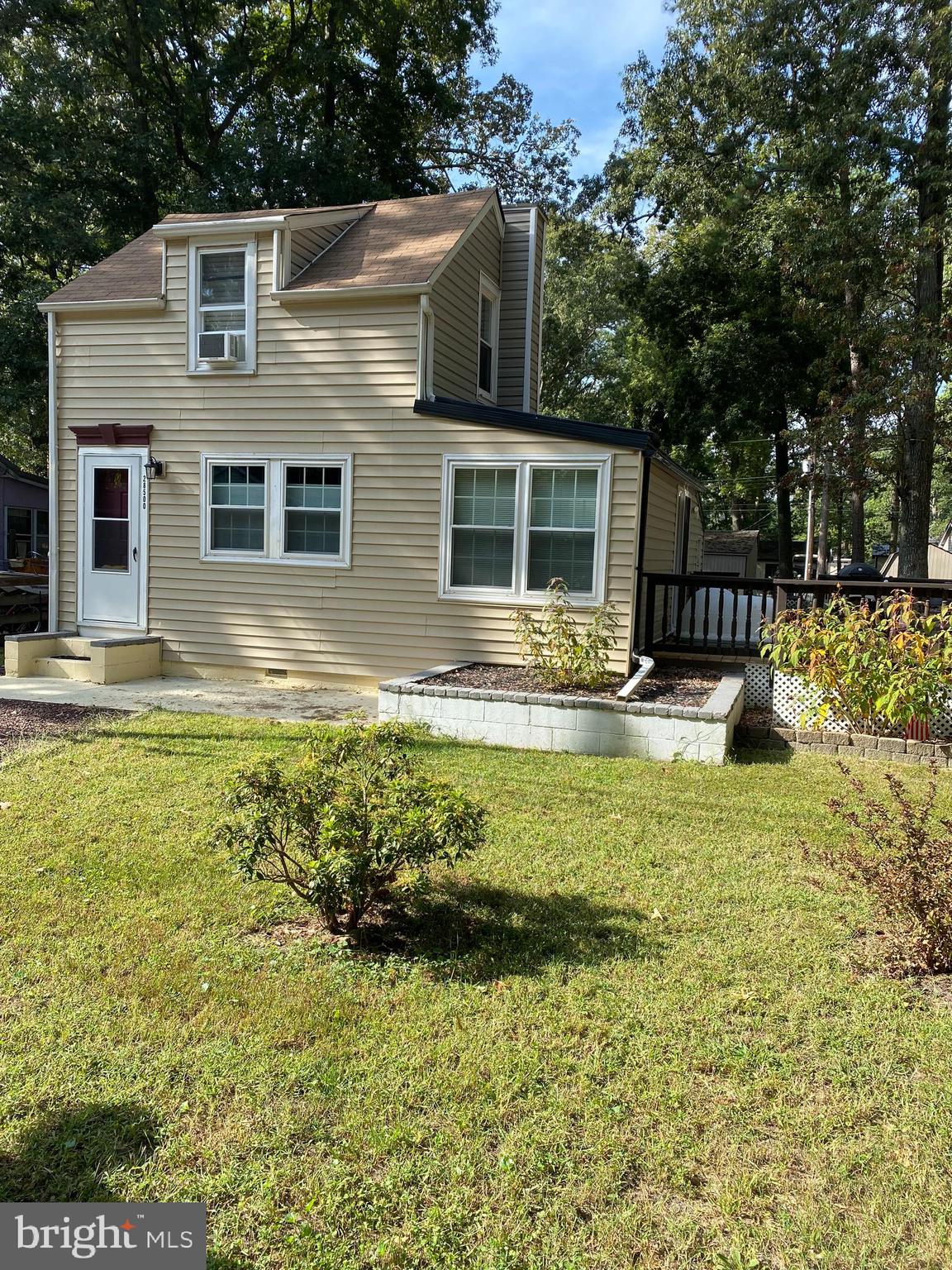 a front view of a house with swimming pool