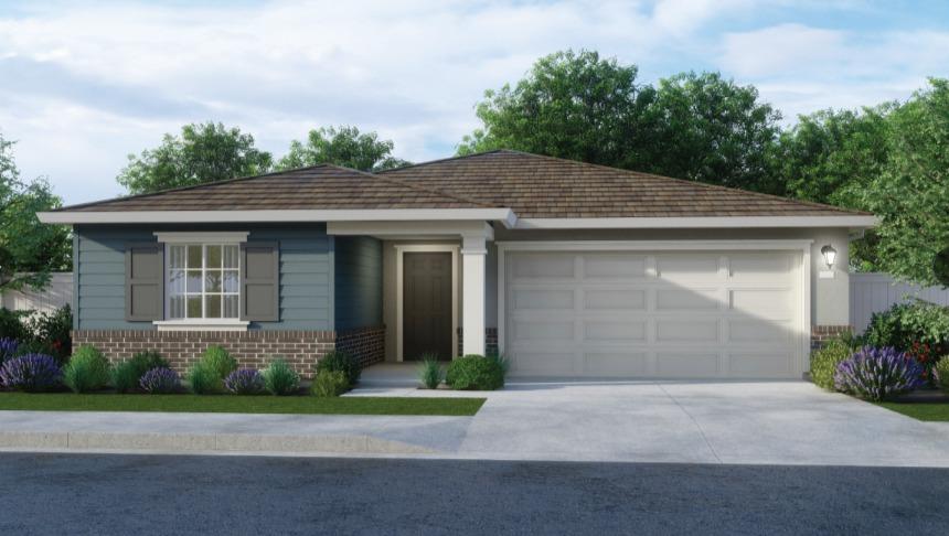 a front view of a house with a garden and garage