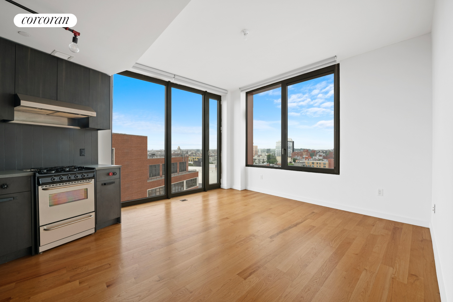 a view of an empty room with a stove top oven