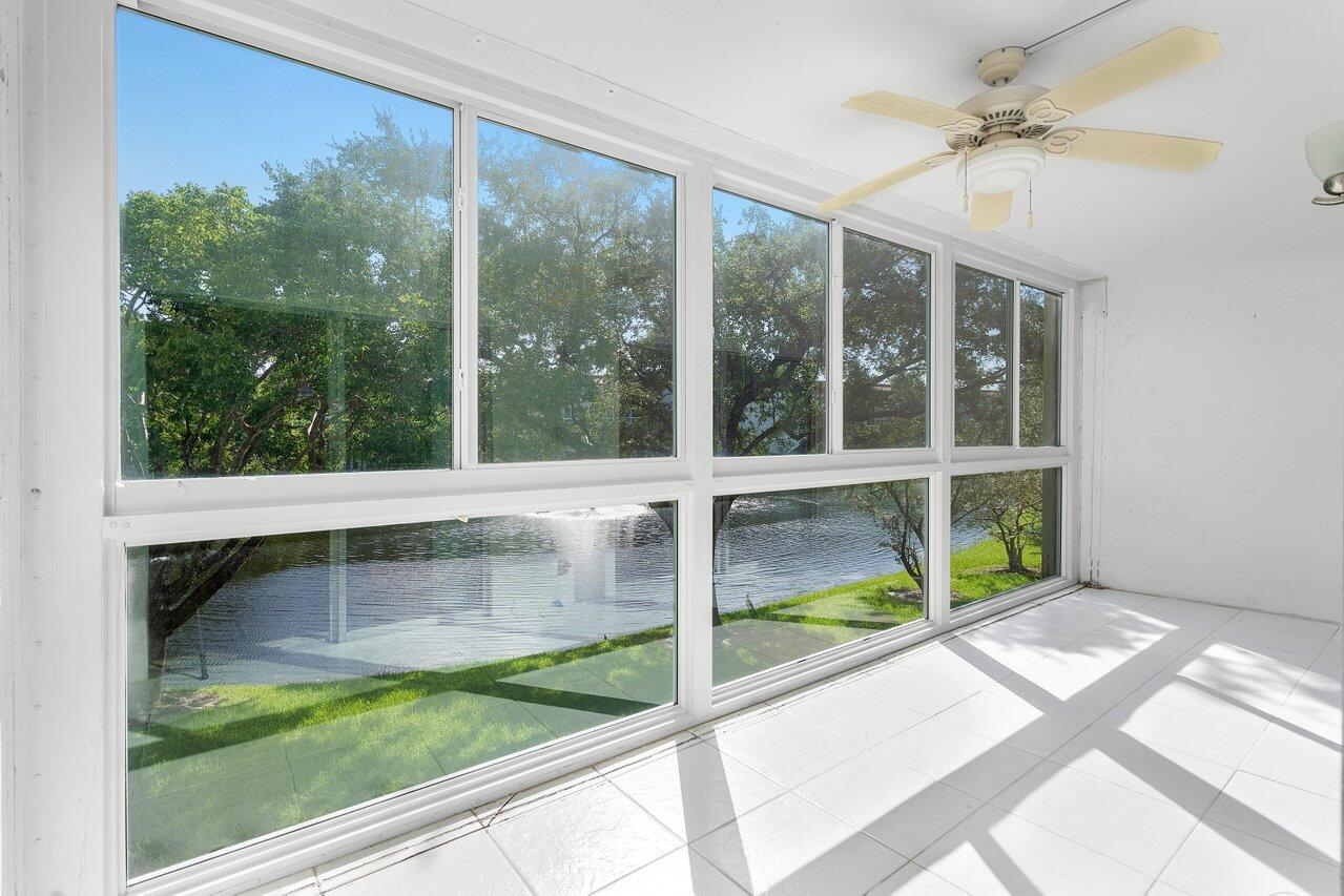 a view of a porch and a yard