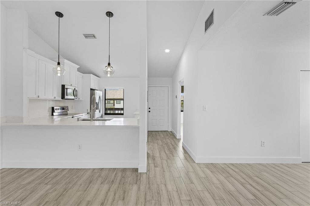 a very nice looking room with a wooden floor