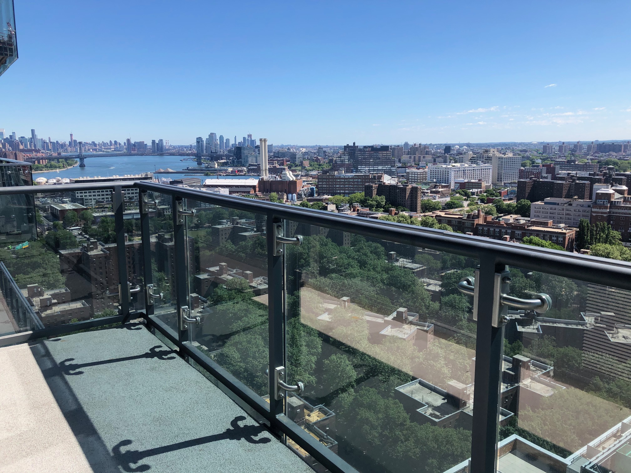 a view of a lake from a balcony