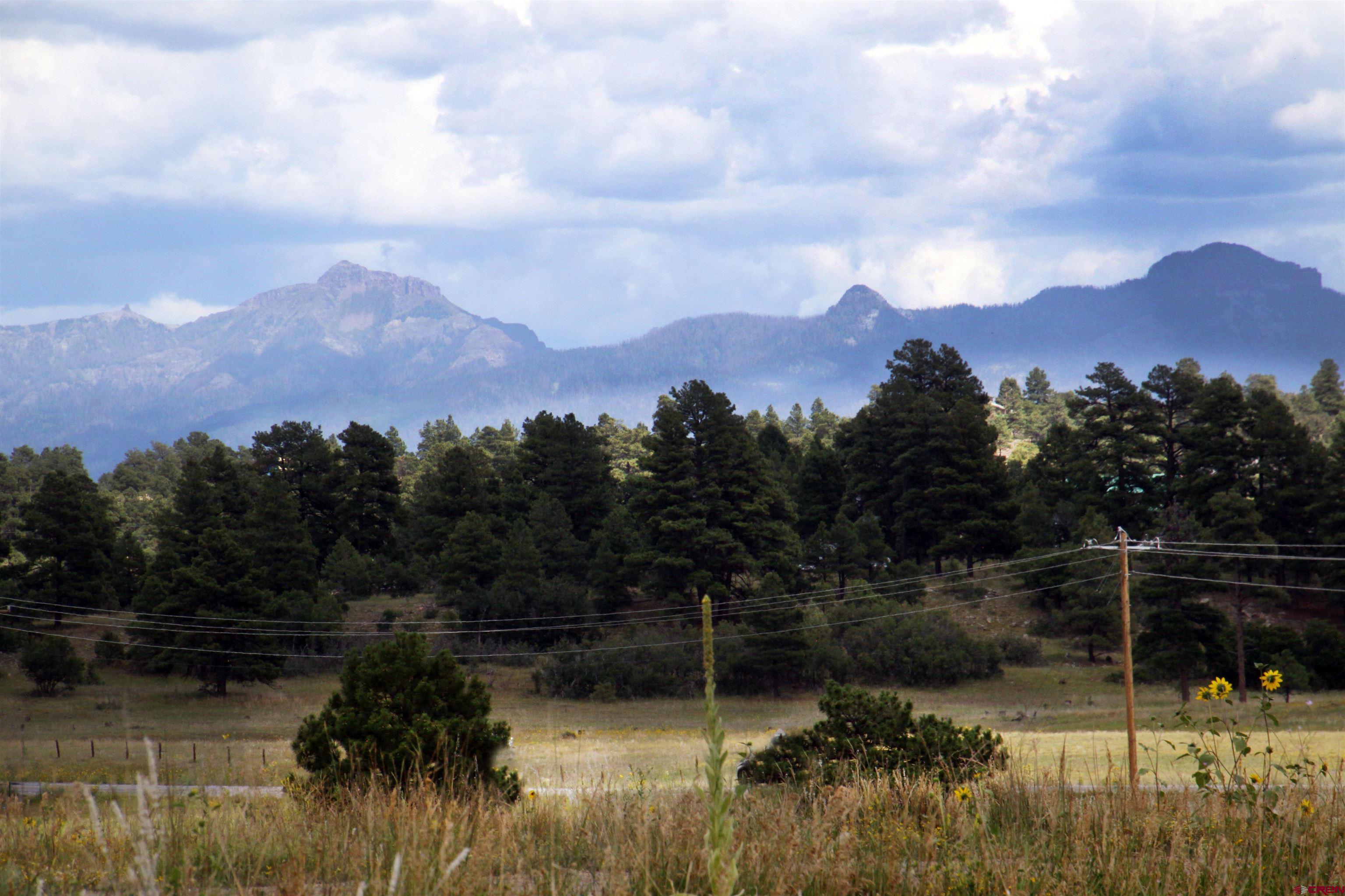 a view of lake with mountain